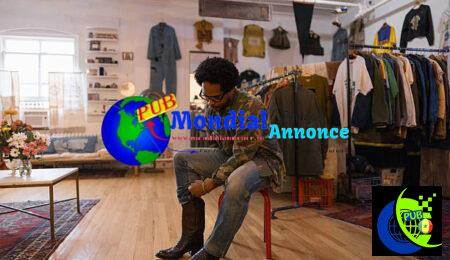 Small business owner preparing to assist customers by adjusting his cowboy boots in his vintage clothing store istockphoto 2214553996 612x612 1